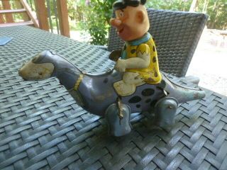 Vintage Flinstones Tin Wind Up Toy Marx Fred Riding Dino Extremely Rare.  1962