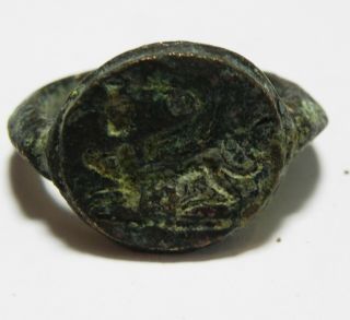 Zurqieh - As13518 - Ancient Greek Bronze Ring.  Human Headed Animal.  600 - 300 B.  C