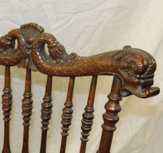 Antique Victorian Oak Rocking Chair – with spindles carved dolphin 4