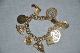 38.  60g Vintage 1960’s 19k 18k 14k 12k Gold Charm Bracelet W/ 9 Charms Estate