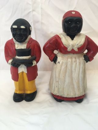 Vintage Cast Iron 10” Aunt Jemima And 9 1/2” Uncle Moses Doorstop/ Coin Bank