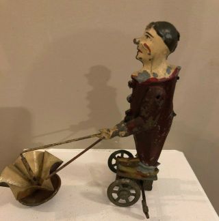 Very Rare Very Early Tin Gunthermann Litho Wind Up Circus Clown On Wheels