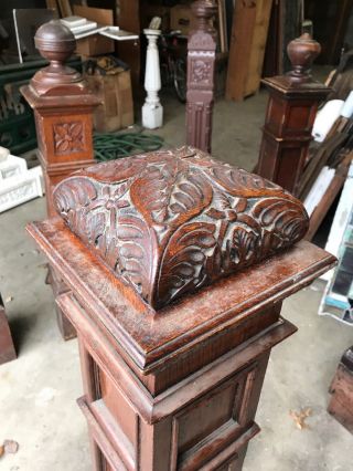 Antique highly carved oak top Newell post 8.  75 square by 52 2