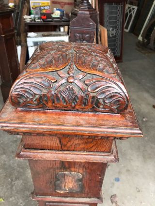 Antique highly carved oak top Newell post 8.  75 square by 52 4