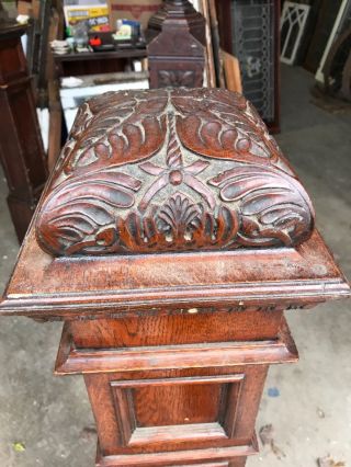 Antique highly carved oak top Newell post 8.  75 square by 52 5