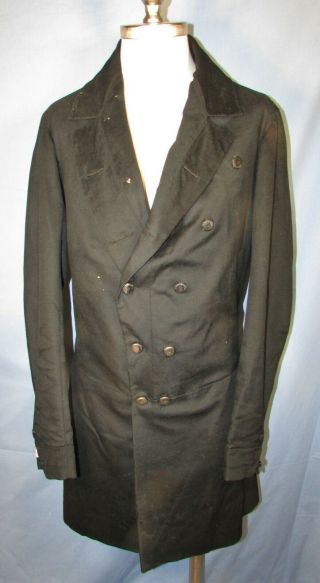 Early,  Mid 19th Century Black Wool Frock Coat,  Quilted Silk Lining