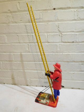 Vintage Marx Climbing Fireman Wind Up Mechanical Toy -