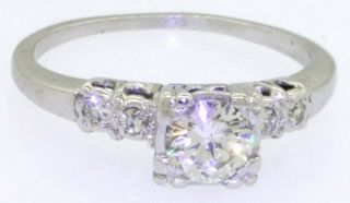 Vintage Platinum.  73CT diamond wedding engagement ring w/.  65CT center size 7 2