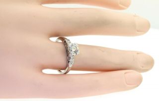 Vintage Platinum.  73CT diamond wedding engagement ring w/.  65CT center size 7 4