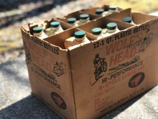 vintage Wolfs Head oil Bottles outboard marine motorcycle cans display 2stroke 2