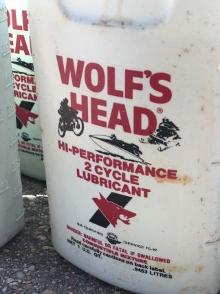 vintage Wolfs Head oil Bottles outboard marine motorcycle cans display 2stroke 5