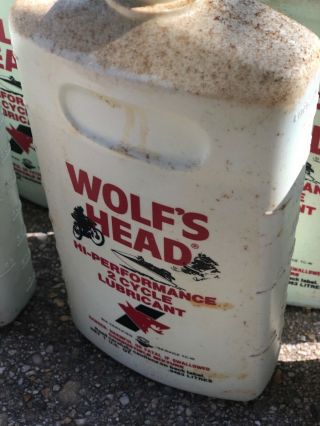 vintage Wolfs Head oil Bottles outboard marine motorcycle cans display 2stroke 6