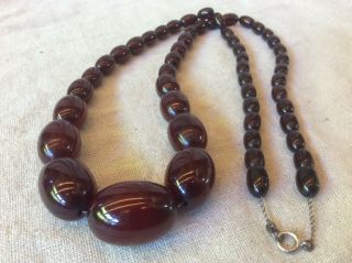 VINTAGE BAKELITE NECKLACE CHERRY AMBER RED OBLONG BEADS threaded on CHAIN 6