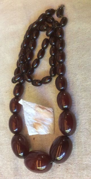 VINTAGE BAKELITE NECKLACE CHERRY AMBER RED OBLONG BEADS threaded on CHAIN 7