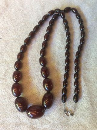 VINTAGE BAKELITE NECKLACE CHERRY AMBER RED OBLONG BEADS threaded on CHAIN 8