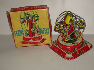 Red China Ferriis Wheels Merry go round Vintage Tin Toy 2