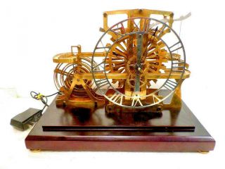 Rare Animated 24 K Gold Plated 3 Ball Spiral Column Ferris Wheel Skeleton Clock