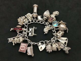 Vintage Sterling Silver Charm Bracelet With 21 Silver Charms.  95 Grams