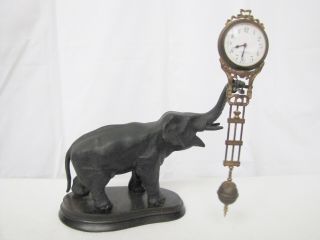 Vintage Elephant Swinging Arm Clock
