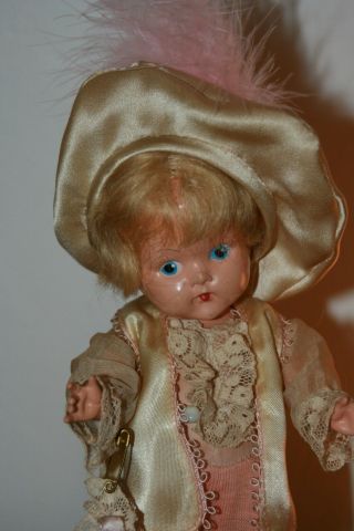 Vintage Vogue Painted Eye Blonde Prince Charming Ginny From 1949 In Pink