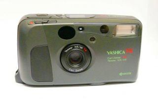RARE: YASHICA T4 (GREEN),  CARL ZEISS T LENS.  ALMOST,  HARDLY. 2
