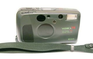 RARE: YASHICA T4 (GREEN),  CARL ZEISS T LENS.  ALMOST,  HARDLY. 5