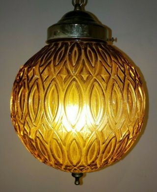 Vintage Mid Century Swag Amber Glass Relief Pattern Globe Pendant Lamp