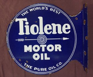 Vintage Tiolene Motor Oil 19”x18” Double Sided Flange Porcelain Enamel Sign.