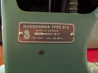 Vintage Husqvarna Viking 21E Sewing Machine,  belts,  and brushes.  vintage 8