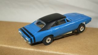 vintage Aurora Model Motoring 1407 - 3.  00 HO Dodge Charger slot car - blue black 6