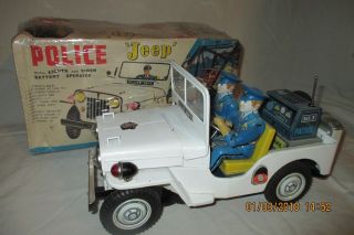 Vintage Japan Tin T.  N Police Jeep Battery Operated -