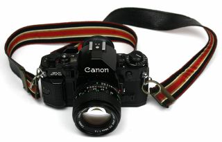 Canon A1 Black Film Slr Camera With Canon 50mm F1.  4 Fd Lens,  Vintage Strap Exc,