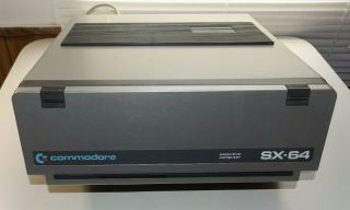 Vintage Commodore SX - 64 Computer.  GOOD KEYBOARD Boots to 