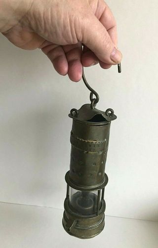 A VINTAGE MINERS LAMP.  WILLIAM.  LEWIS.  LLWYDCOED.  LAMP IS IN 11