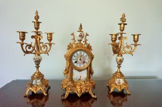 Antique French Gilt Brass And Porcelain Striking Clock And Garniture Set