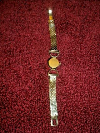 VINTAGE LONGINES LADIES’ 14K GOLD “EQUESTRIAN” WRISTWATCH WITH 14K GOLD BAND 8