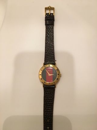 Vintage GUCCI Watch 3000.  2.  L - With Gucci leather band.  0356037 3