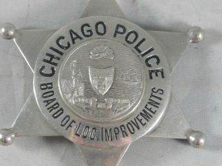 VINTAGE OBSOLETE CHICAGO POLICE BOARD OF LOC.  IMPROVEMENTS BADGE NAMED 2