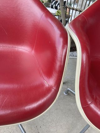 Charles Eames Herman Miller Fiberglass Arm Shell Chair Pair In Red Naugahyde