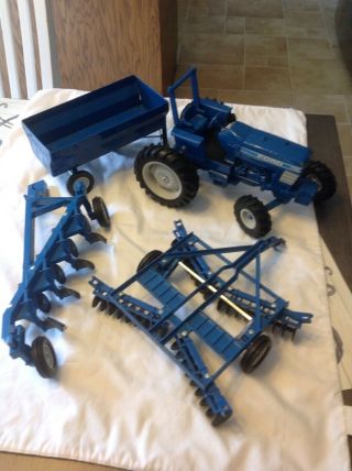 Vintage Ertl 1/16 Ford 7710 Diecast Tractor Blue W Accessories