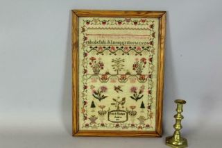 A RARE SIGNED & DATED PA 1831 NEEDLEWORK SAMPLER 