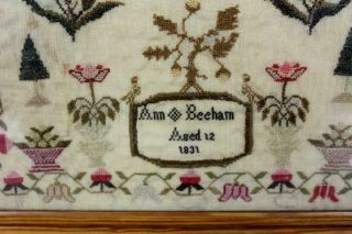 A RARE SIGNED & DATED PA 1831 NEEDLEWORK SAMPLER 