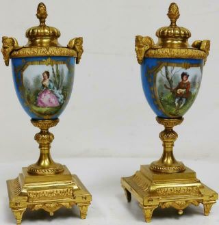 Rare Antique French Gilt Bronze & Blue Sevres Porcelain Clock Garnitures