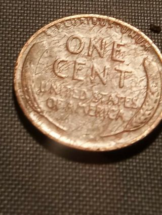 Very rare 1949 D Wheat penny with error die cracks pink in color 2