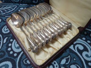 Set Of 12 Sterling Silver Decorative Antique Spoons In Vintage Box.
