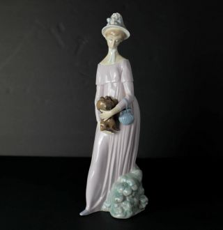 Vintage Lladro Daisa 1978 Porcelain Figure,  Young Woman Holding Pekinese Dog