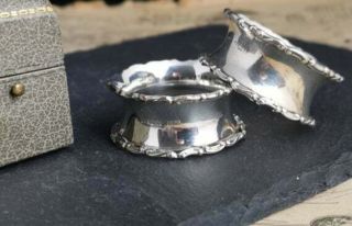 Antique sterling silver napkin rings,  pair,  boxed 4