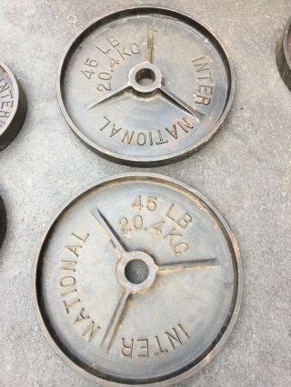 Two International Deep Dish Vintage 45lb Olympic Weight Plates