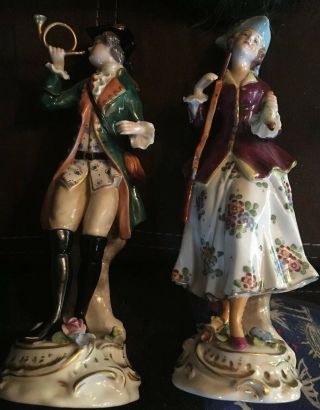 Vintage German ? Porcelain Man With Horn - Woman With Rifle Figurines H - 7”