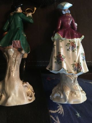 Vintage German ? Porcelain Man With Horn - woman With Rifle Figurines H - 7” 8